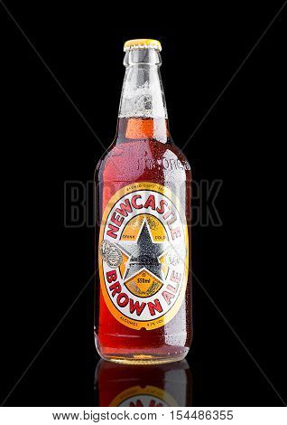 LONDON UK - NOVEMBER 01 2016: Cold bottle of Newcastle Brown Ale beer. Launched in 1927 by Colonel Jim Porter after the merger of Newcastle Breweries with Scottish Brewers.