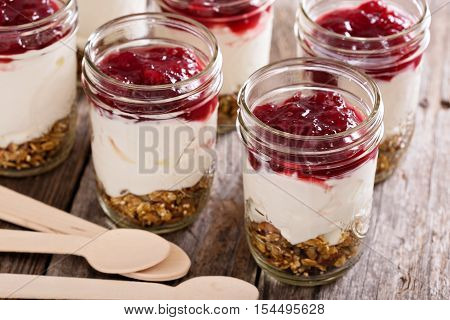 Autumn granola parfait with yogurt and cranberry jam