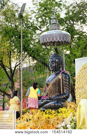 Bangkok, Thailand - December 5, 2015: Young asian women praying Buddha Sanam Luang Bangkok Thailand.
