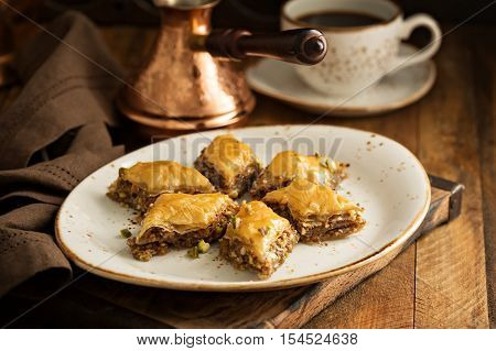 Homemade baklava with nuts and honey syrup