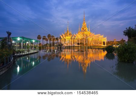 Wat Luang Pho Toh Temple With Water Reflection In Twilight Time, Thailand