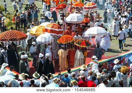 Gondar Ethiopia - January 19 2016: A crowd of faithful and tourists surrounding a procession in the annual religious celebration of Timket (epiphany)