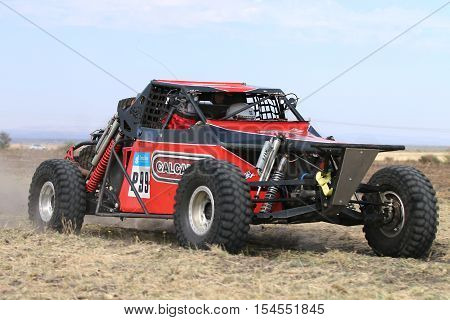 Forty Five Degree Close-up View Of Speeding Red Hellcat Rally Car