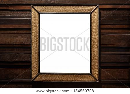 Rattan wicker wooden picture frame. rattan wicker wooden wall mirror decorate, on hardwood wall, isolated on white background