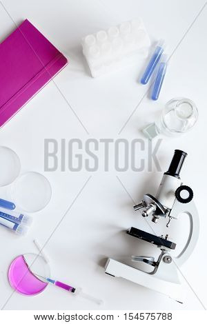 doctor workplace with microscope at lab top view no one