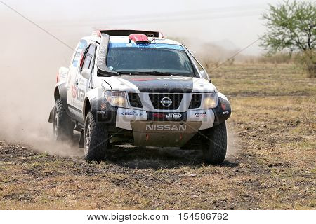 Front View Close-up Of Racing Black And White Nissan Navara Rally Car