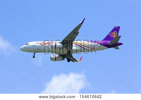 CHIANGMAI , THAILAND -APRIL 1 2014: HS-TXO Airbus A320-200 of Thaismile airway. Landing to Chiangmai airport from Phuket.