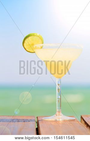 Margarita Cocktail On The Wooden Pier. Concept Of Classic Drink. Vacation Background