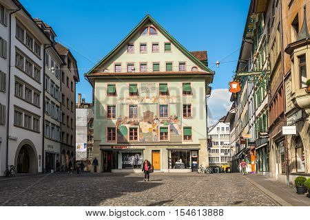 Lucerne Switzerland - May 24 2016: Architecture of Lucerne. The picturesque Weinmarkt in Luzern Switzerland. There is a area market every first Saturday of the month from April to December is also a Christmas market in December.