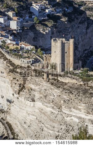 Alcala del Jucar Spain - October 29 2016: Panoramic view of the city on top of limestone mountain is situated Castle of the 12TH century Almohad origin take in Alcala of the Jucar Albacete province Spain