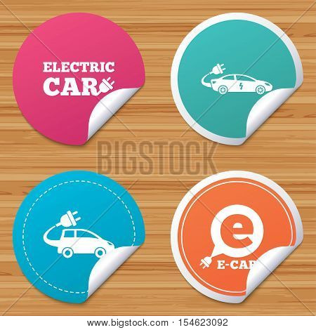 Round stickers or website banners. Electric car icons. Sedan and Hatchback transport symbols. Eco fuel vehicles signs. Circle badges with bended corner. Vector