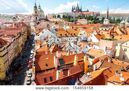 Cityscape aerial view on the Lesser town with castle hill and churches in Prague city