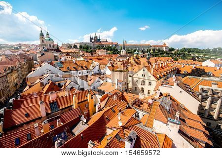 Cityscape aerial view on the Lesser town with castle hill and churches in Prague city