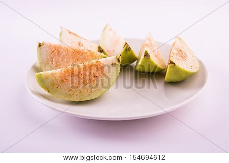 Guava fruit or Amrood or Amrud or peru isolated, selective focus