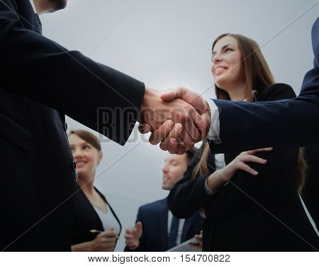 Business handshake. Business handshake and business people conce