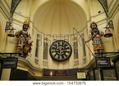 MELBOURNE, AUSTRALIA - JANUARY 24, 2016: Gog and Magog with Gaunt's clock at Royal Arcade in Melbourne. The arcade was originally constructed in 1869.