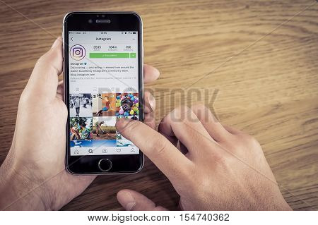 CHIANG MAI THAILAND - AUG 272016: A women holds Apple iPhone 6S with Instagram application on the screen. Instagram is a photo-sharing app for smartphones.