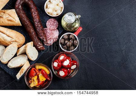 Spanish Tapas With Slices Jamon Serrano And Grilled Pepper. Also