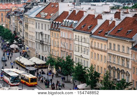 Warsaw Poland - May 28 2015: Traditional european architecture with tourists in Old town in Warsaw in a summer Poland. Aerial view from above