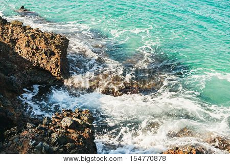 Natural rocks and turquoise sea waters at Kleopatra beach, Alanya, Turkey, Mediterranean coast