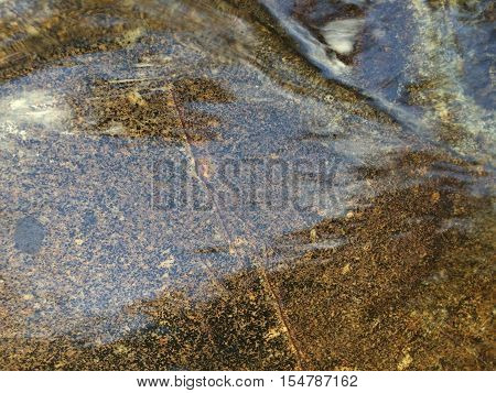Pure water stream surface on rock.Feeling fresh by nature