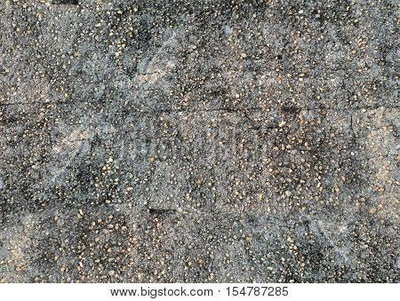Dark granite stones concrete texture background.Abstract street style
