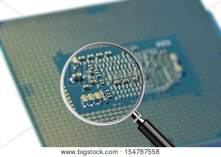 Clear image in magnifying glass against blurry close-up of back side of a CPU with connectors and chips
