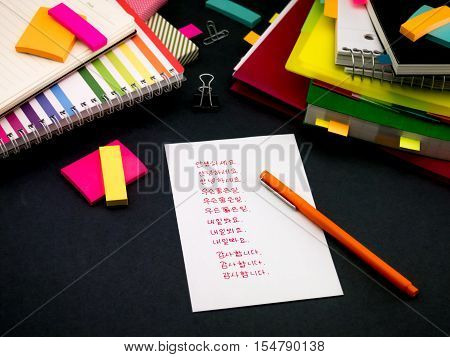 Learning New Language Writing Words Many Times On The Notebook; Korean