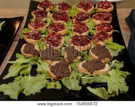 Crunchy Bread Slices With Cooked Minced Meat And Tomato Cubes, Green Salad For Decoration