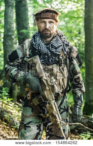 Member of Navy SEAL Team also known as Taliban hunter with weapons