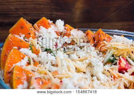 Vegan Dish Of Orange Pumkin, Vegetables, Herbs And Cheese