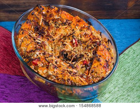 Vegetarian Dish Of Baked Orange Pumkin, Mixed Vegetables, Herbs, Cheese