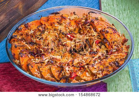 Vegetarian Baked Dish Of Orange Pumkin, Vegetables, Herbs, Cheese