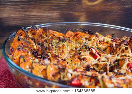 Vegetarian Dish Of Baked Pumkin, Vegetables, Herbs, Cheese