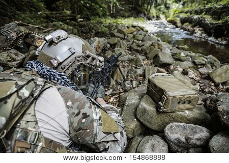 United states army ranger machine gunner in the forest