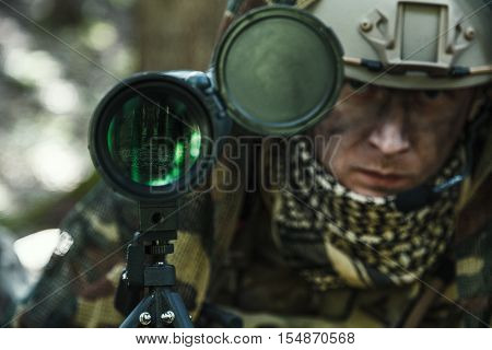 United states army ranger spotter in the forest