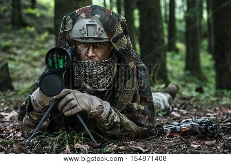 United states army ranger spotter in the forest
