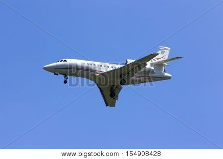 CHIANGMAI , THAILAND -APRIL 1 2014: N28VL. Private AIrcraft, Dassault Falcon 900EX. Landing to Chiangmai airport. Thailand.