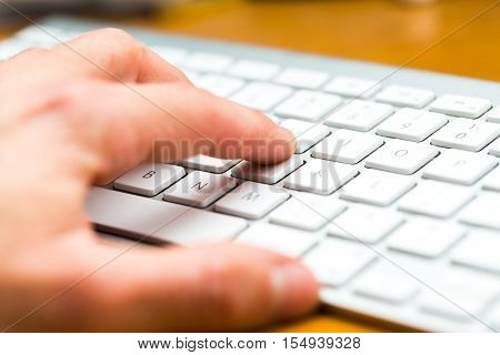 Close Up Of White Wireless Aluminum Keyboard