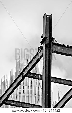 Construction Worker Working On Highrise Building