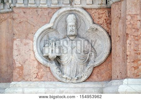 BOLOGNA, ITALY - JUNE 04: Saint Petronio by Giovanni di Riguzzo relief on facade of the San Petronio Basilica in Bologna, Italy, on June 04, 2015