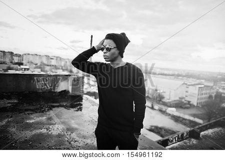 Portrait Of  Style Black Man On The Roof. Black And White Photo