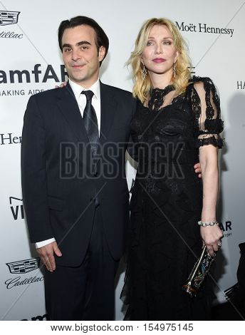 LOS ANGELES - OCT 27:  Courtney Love and Nicholas Jarecki arrives to the amFAR's Inspiration Gala on October 27, 2016 in Hollywood, CA                