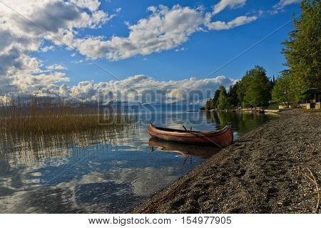 Little Kanu at a stone beach on Lake Ohrid in Mazedonia.