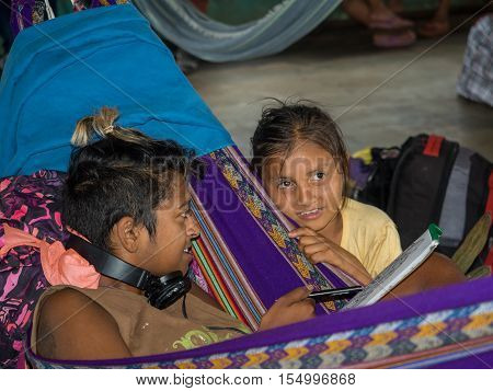 Woman And Girl On Cargo Boat