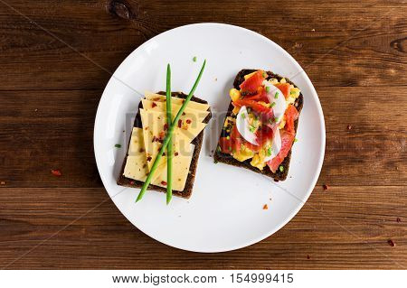 Smorrebrod - danish open sandwich with fish herring cheese