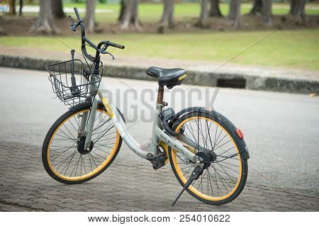 Phuket, Thailand - 10 August 2018- Black Yellow Obike Smart Rental Bicycle Parking On Footpath At Sa