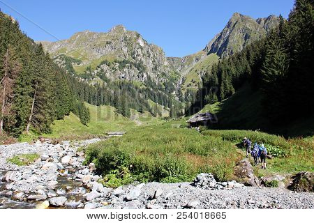 Valea Rea, Romania - August 11: People Trekking In The Mountains -valea Rea Trail To The Moldoveanu 