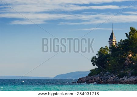 House By The Adriatic Sea Sidelit By Golden Color Of Setting Sun