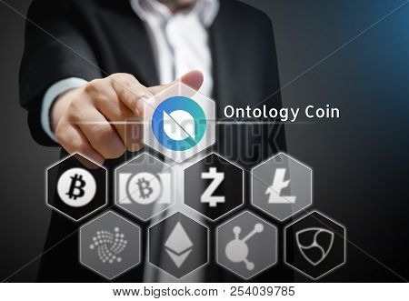 Business Man Points His Finger At  Ontology Coin Icon  Among Others Cryptocurrency On Virtual Touch 